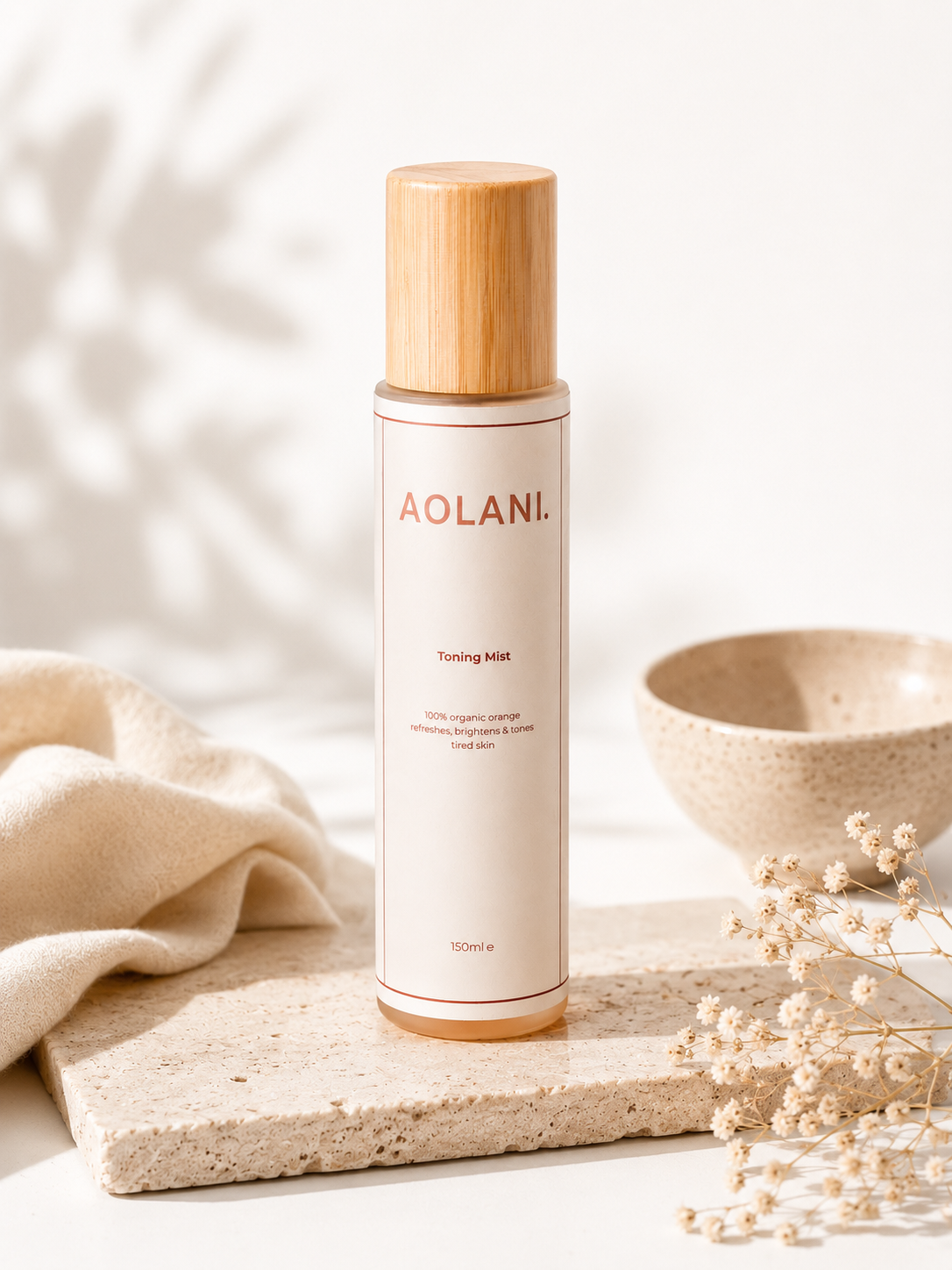 Aolani Organic Toning Mist in a fresh skincare lifestyle setting with citrus details and spa-inspired styling