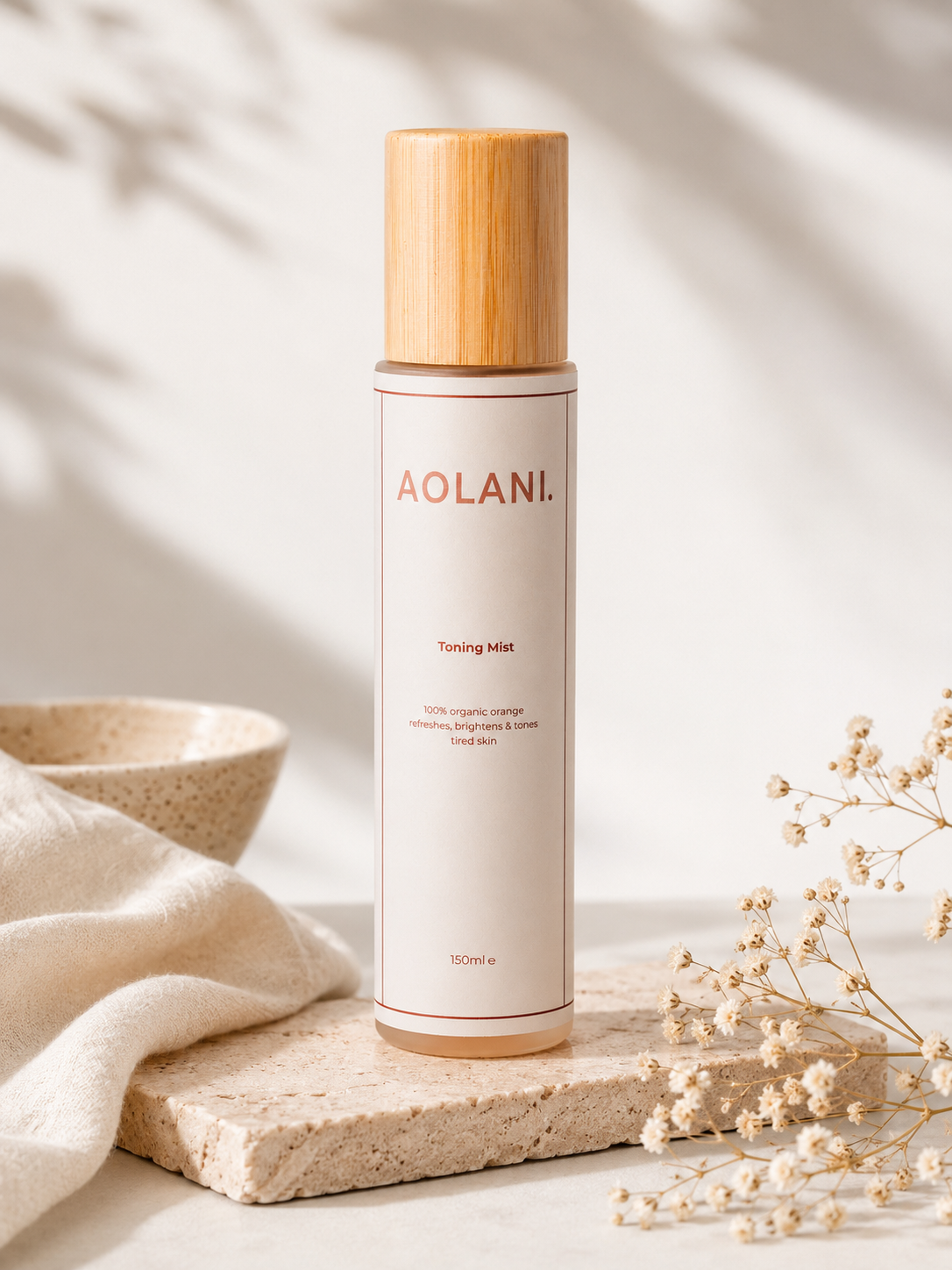 Aolani Organic Toning Mist for sensitive skin displayed in a bright luxury spa setting with soft natural light