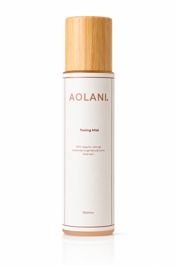 Aolani Organic Toning Mist for sensitive skin in a frosted bottle with bamboo cap on a clean white background